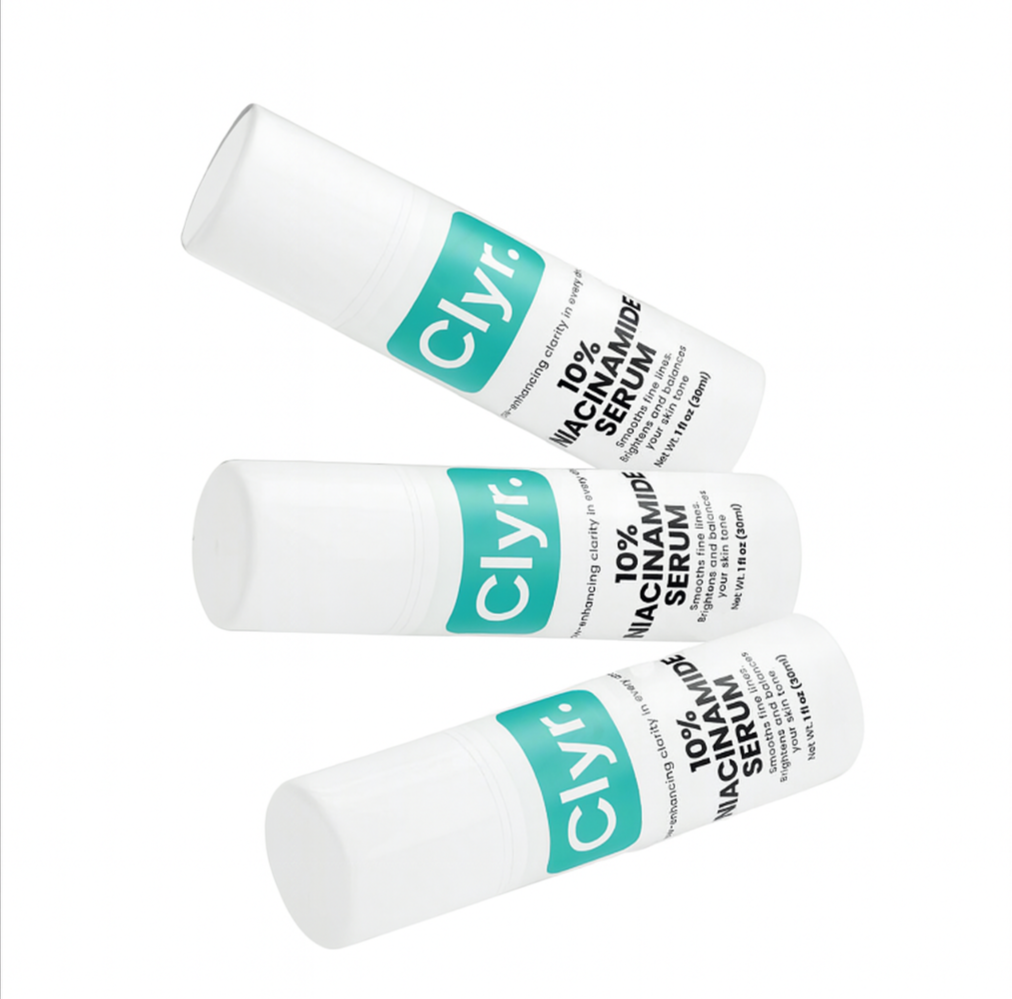 Three bottles of Clyr 10% Niacinamide Serum on a white background